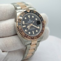 Réplique Montre Rolex GMT-Master II Root Beer Or Acier Cadran Noir 126711CHNR